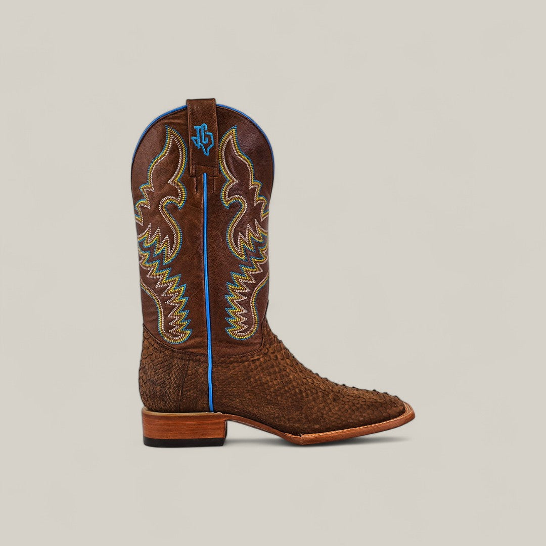 The Exotic Python - Tamarindo - Square Toe boot features a textured python lower, decorative yellow and blue stitching, a wooden heel, and blue trim, all from the Platinum Collection. Displayed on a plain light background.