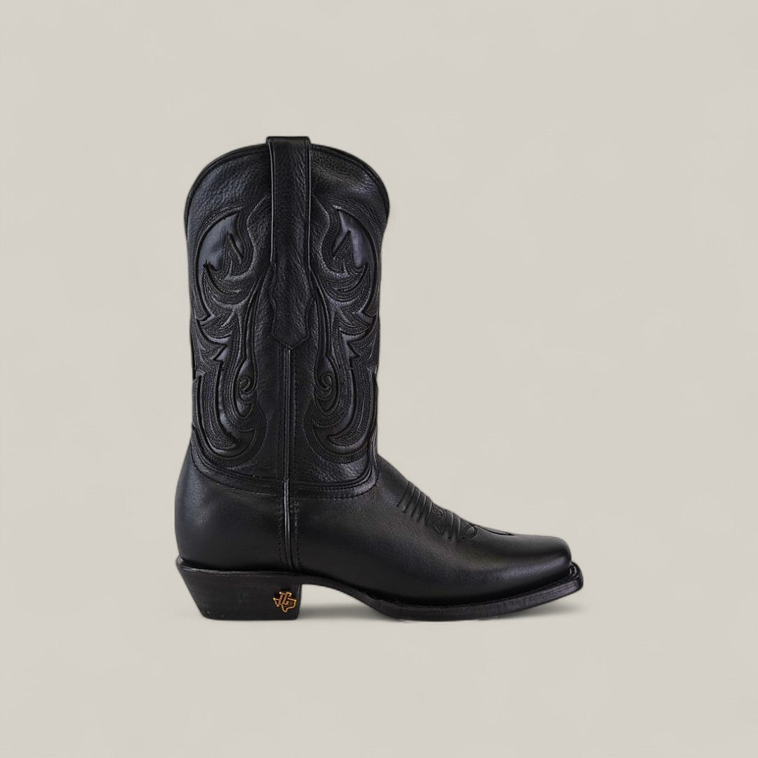 The Josie Full Black - Short Shaft - Narrow Square Toe is a stylish black leather cowboy boot with decorative stitching, a narrow square toe, and a low angled heel—an elegant addition to any women’s boots collection.