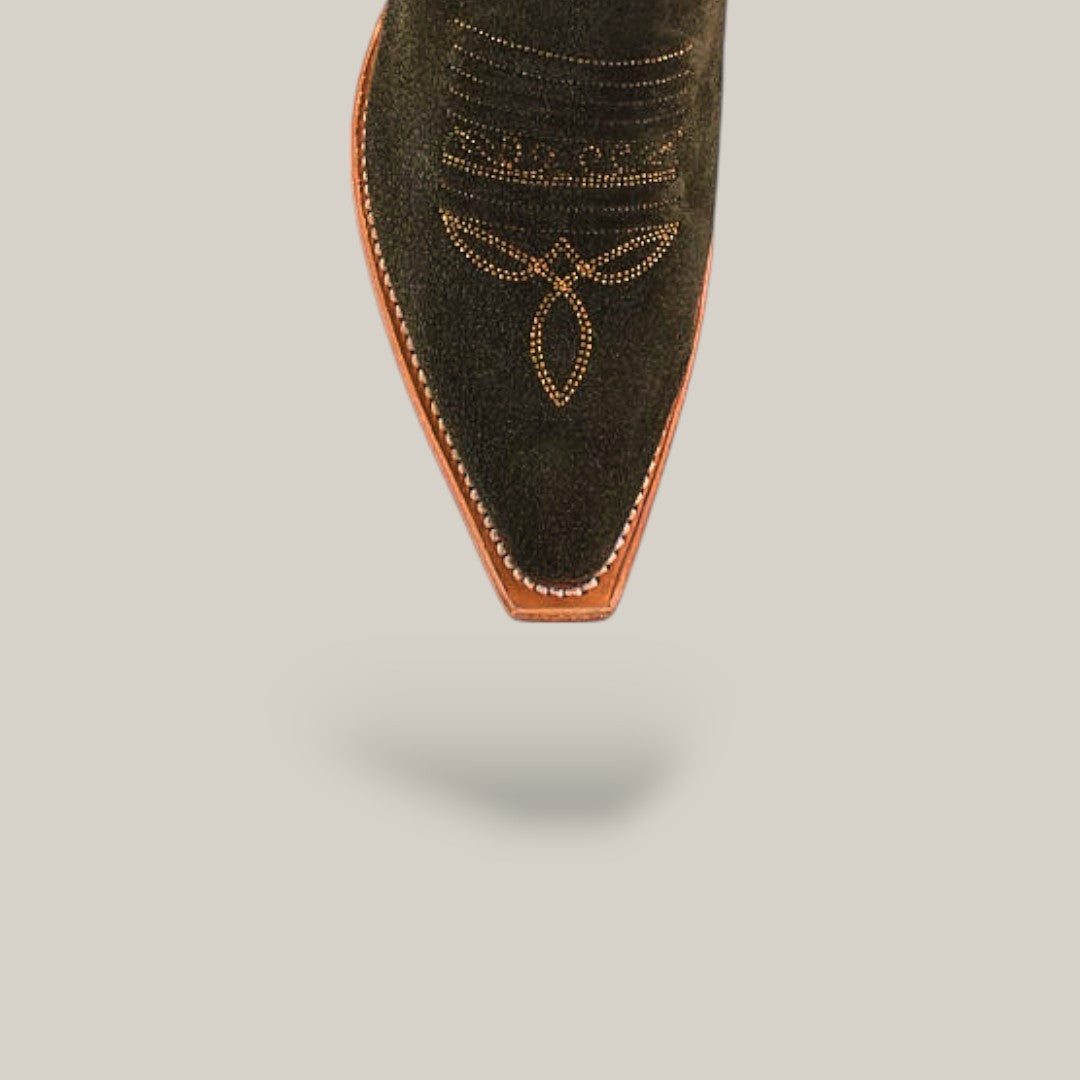 A close-up of the snip toe on the Della Olive Green - Tall Shaft cowboy boot, featuring intricate gold stitching on olive green leather, set against a plain light background with a soft shadow underneath.