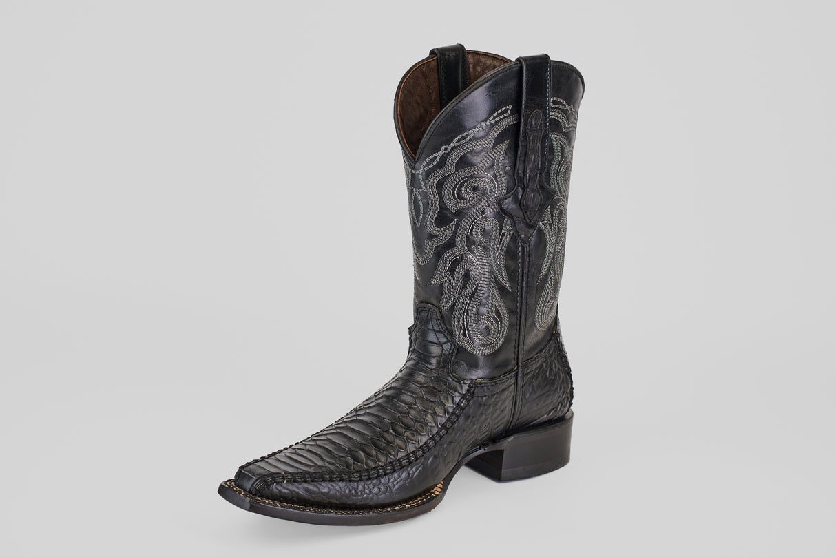 The Python Black - Embossed Leather - Versy Toe (E202) cowboy boot features intricate silver embroidery on the shaft and a textured, pointed toe, shown on a light gray background—ideal for bold western style enthusiasts.