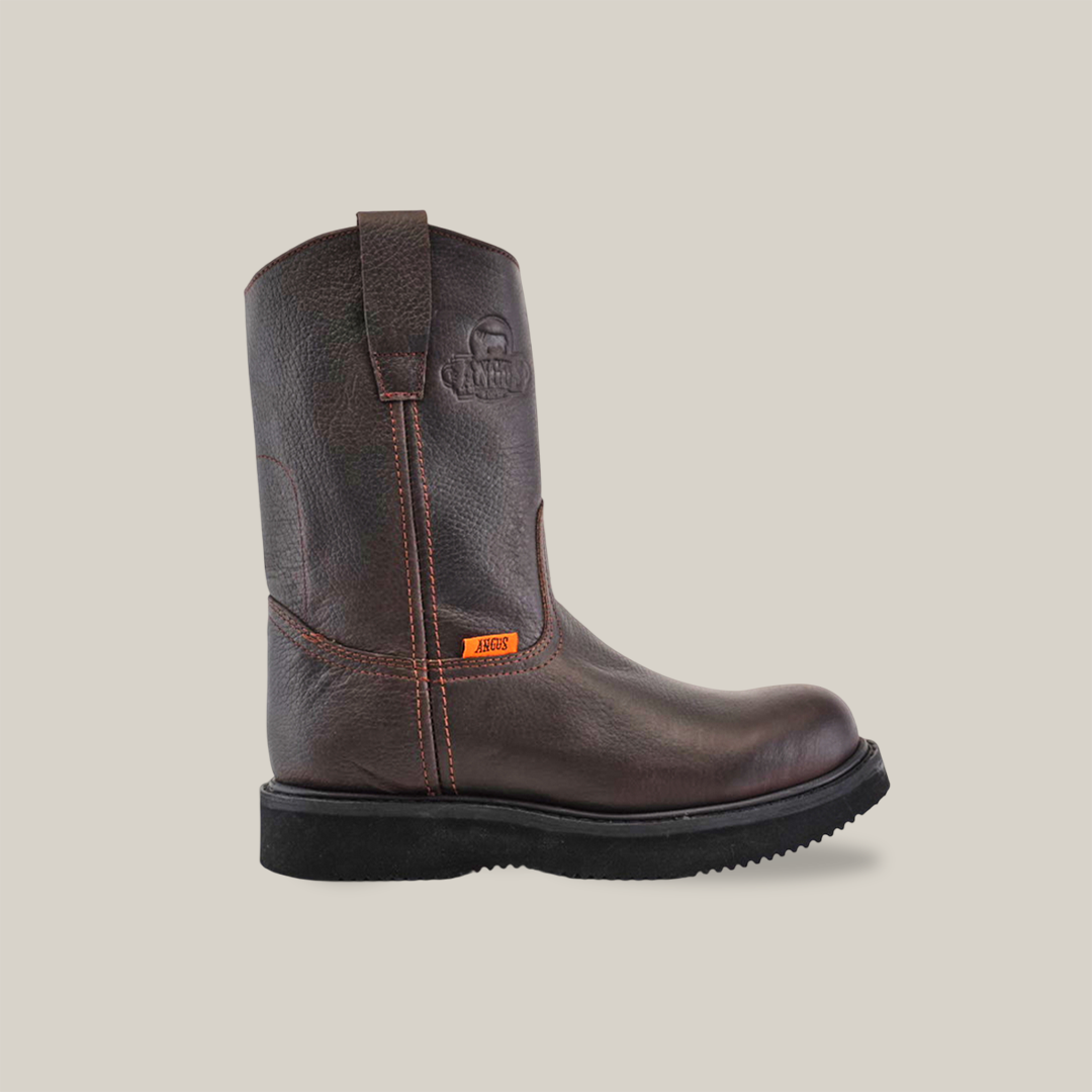 The Brown Roper - Laredo Sole - Soft Toe boot is shown on a plain white background, showcasing premium cowhide in brown with orange stitching, a pull strap, and a black sole. It features exceptional craftsmanship and includes a small orange label on the side.