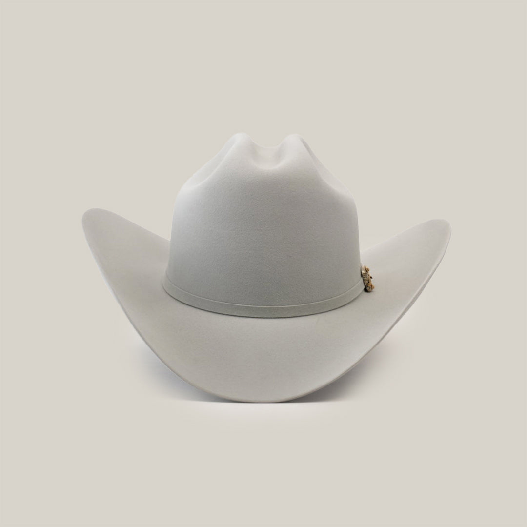 The 1000X Imperial Platinum, a light gray Western hat with a wide brim and subtle band, is reminiscent of the Larry Mahan collection. It is elegantly displayed against a plain white background.