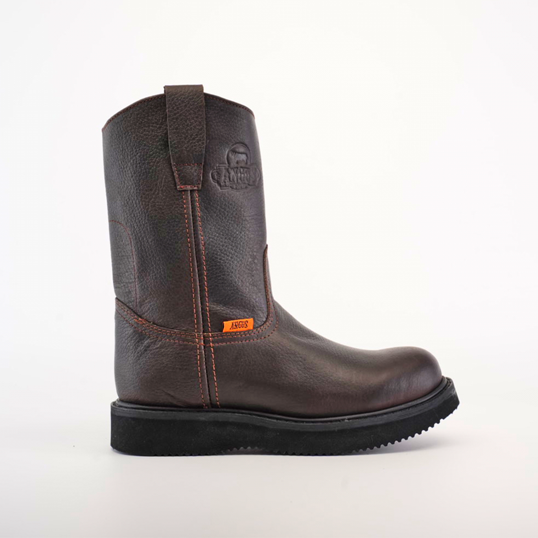 The Brown Roper - Laredo Sole - Soft Toe boot is shown on a plain white background, showcasing premium cowhide in brown with orange stitching, a pull strap, and a black sole. It features exceptional craftsmanship and includes a small orange label on the side.