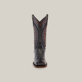 Front view of the Exotic Karoo Ostrich - Herradura boot in black with a square toe, crafted from exquisite ostrich leather. Intricate brown and black patterns on the high shaft capture Western fashions essence, all part of our premium Platinum Collection against a plain background.