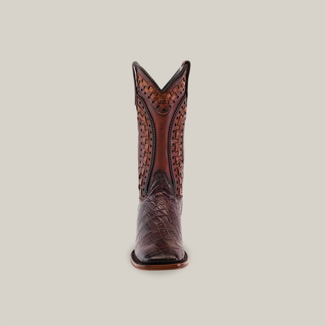 Front view of the Exotic American Alligator - Herradura boot in Tabaco, showcasing intricate stitching and patterns against a plain background. It features a square toe and high shaft with decorative elements, crafted using Goodyear welt construction for durability.