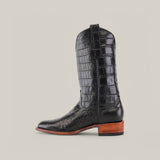 The Exotic Full American Alligator - Black - Round Toe is depicted from the side on a plain beige background, showcasing its premium alligator leather texture and wooden heel.