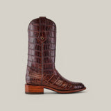 The Exotic Full American Alligator - Brown - Round Toe boot features glossy, intricately patterned American Alligator leather. This luxury accessory highlights a wooden heel and round toe against a simple beige backdrop, embodying elegance and fine craftsmanship.