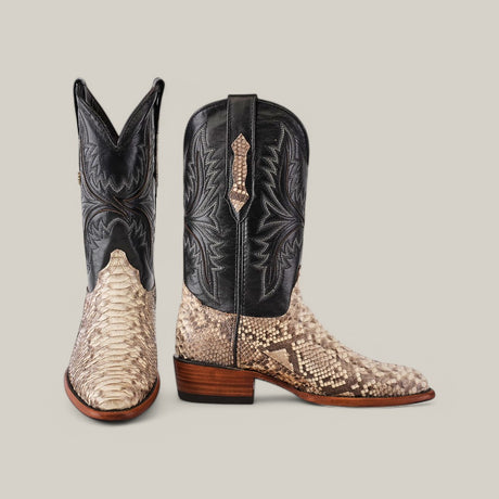 The Exotic Python - Natural - Round Toe boots showcase black leather shafts with intricate stitching, natural python-patterned vamps, and brown wooden heels, all set against a plain background.