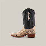 The Exotic Python - Natural - Narrow Square Toe boot has a black shaft, beige textured vamp with a reptile pattern, decorative stitching, pull strap, and wooden heel.