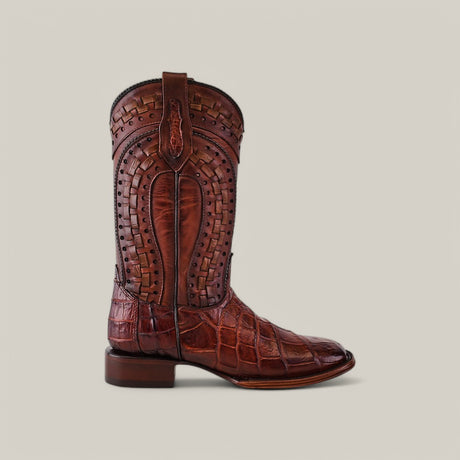 A single Exotic American Alligator - Herradura - Brandy cowboy boot with a square toe and low heel, crafted from authentic alligator leather with intricate stitching and texture, is displayed on a plain beige background.