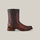 The Exotic American Alligator - Europe Fawn boot features a brown round toe design with intricate leather stitching and textured alligator pattern. It has a medium-height shaft and low heel, showcasing a refined style against a plain background.