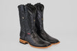 The Blaze – Black – Square Toe cowboy boots, made from genuine lizard leather with decorative stitching, wooden heels, and tan soles, are showcased against a light gray background.