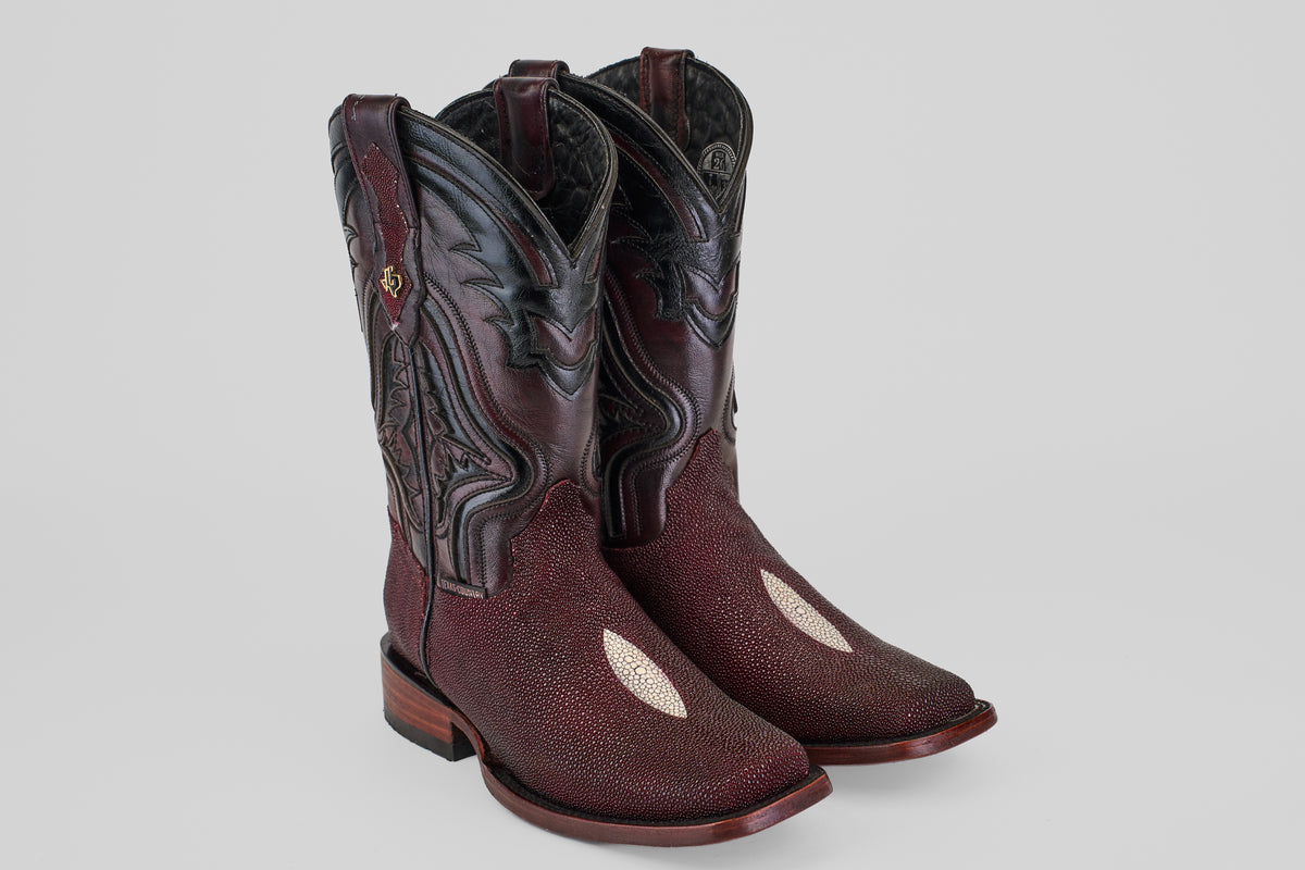 The Ranger – Wine – Rodeo Toe boots are tall cowboy boots in dark brown with decorative stitching and white oval inlays on the toes, featuring a classic rodeo toe design. They're displayed on a plain light background.