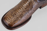 Close-up of the toe of the Tanner Platinum - Dune - Square Toe (Imperial) brown leather dress shoe, showcasing a python-inspired reptile pattern and square toe design against a plain light background.