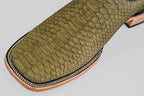 Close-up of the Tanner - Green Jungle - Square Toe cowboy boot, featuring green, python-textured leather and detailed light brown, black, and white stitching—ideal for a standout western look.