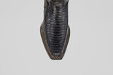 Close-up top view of the Python Black - Embossed Leather - Versy Toe (E202) cowboy boot, showcasing its square toe and detailed brown stitching along the sole, set against a plain light background for authentic western style.