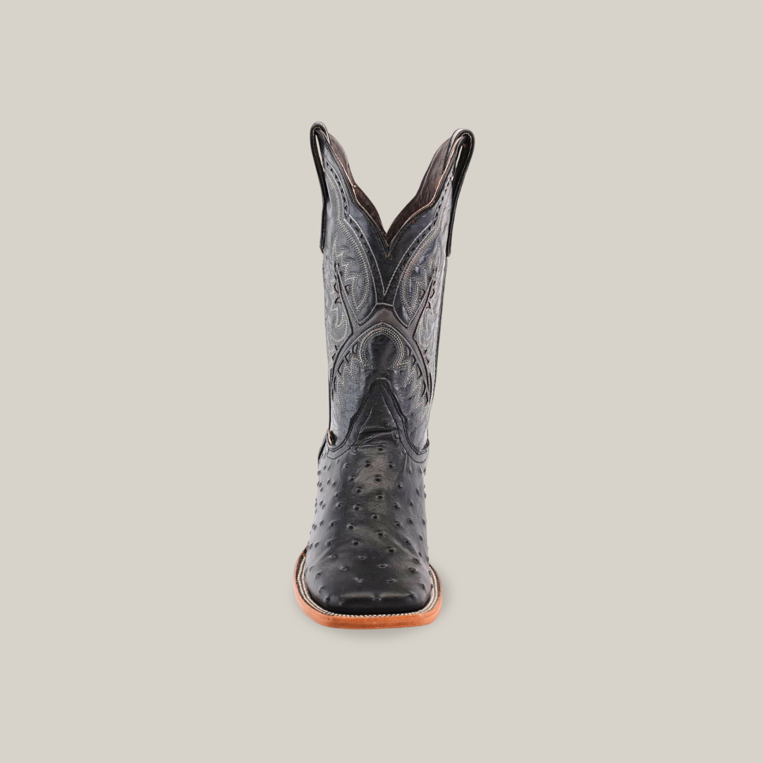 Front view of the handcrafted Karoo Ostrich Print Black Cowboy Boot, showcasing intricate embroidery with a square toe and brown sole, all set against a plain white background.