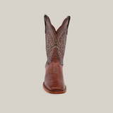 Front view of a single premium cowhide leather cowboy boot, Python Print Brown - Square Toe, with intricate stitching on a white background. It features pointed toes and detailed snake print patterns along the shaft.