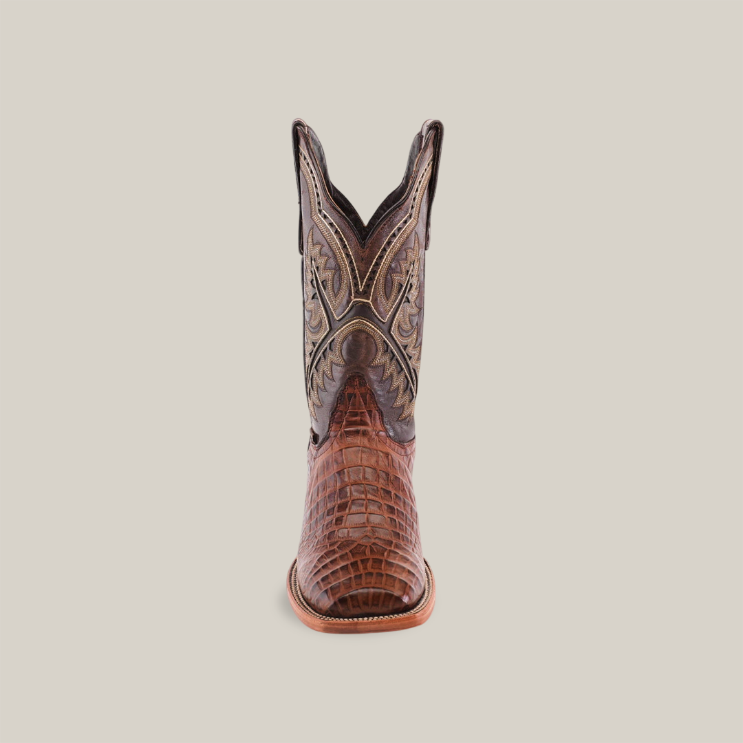 Front view of the handmade Caiman Belly Print Chocolate - Square toe boot, showcasing intricate embroidery and a textured caiman belly print against a clean, light gradient background.