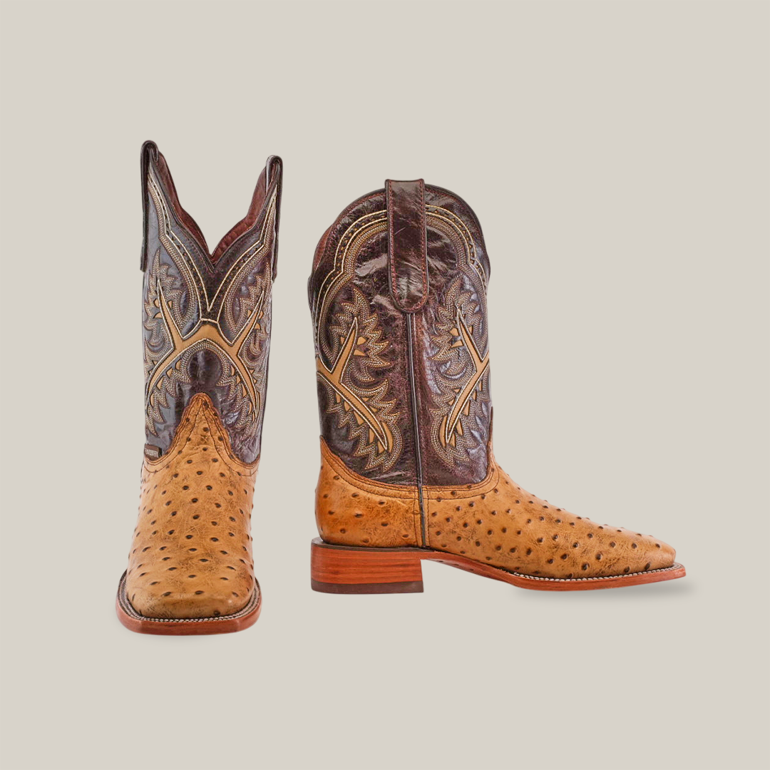 A pair of Karoo Ostrich Print Orix - Square Toe cowboy boots, crafted from premium cowhide in tan with intricate brown stitching on the shafts. One boot faces forward and the other shows a side profile against a plain white background.