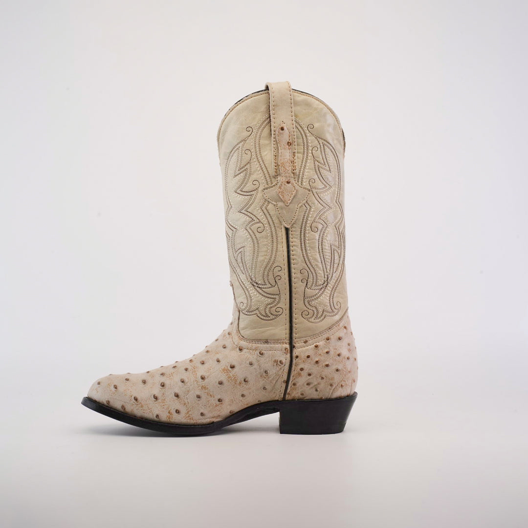 The Karoo Ostrich Print Bone - Round Toe is a single, light-colored cowboy boot with ornate stitching and a textured ostrich print surface, featuring a low heel and leather sole on a plain white background.