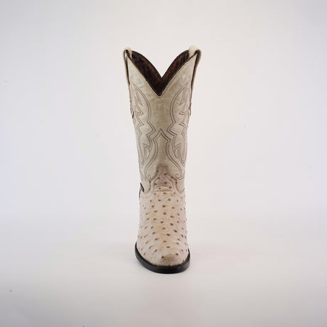 The Karoo Ostrich Print Bone - Round Toe cowboy boot showcases intricate stitching on a plain white background. Handcrafted with a pointed toe, slightly curved top, and leather sole, its ostrich print texture adds distinctive elegance.