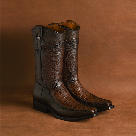 A pair of Arauco Chocolate Caiman Laser boots in brown leather with a textured pattern and matching background. These boots feature dark brown detailing, a glossy finish on the lower part, and a stylish narrow square toe.