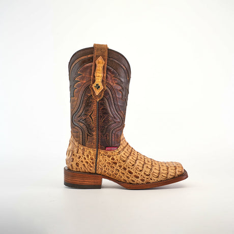 The Exotic Caiman Hornback - Antique - Rodeo Toe cowboy boot showcases a textured design with a brown upper featuring intricate stitching and an authentic caiman leather lower in a tan crocodile skin pattern. Its wooden sole and heel create a striking look on a plain white background.