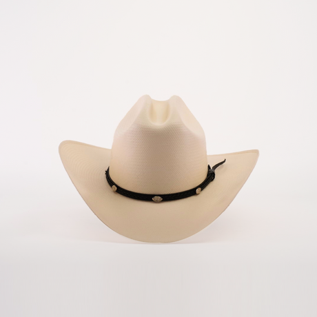 Introducing the 500X Sinaloa Straw Hat, a beige cowboy hat with timeless style and unmatched quality. It features a wide brim and a black decorative band adorned with round golden ornaments, beautifully set against a plain white background.