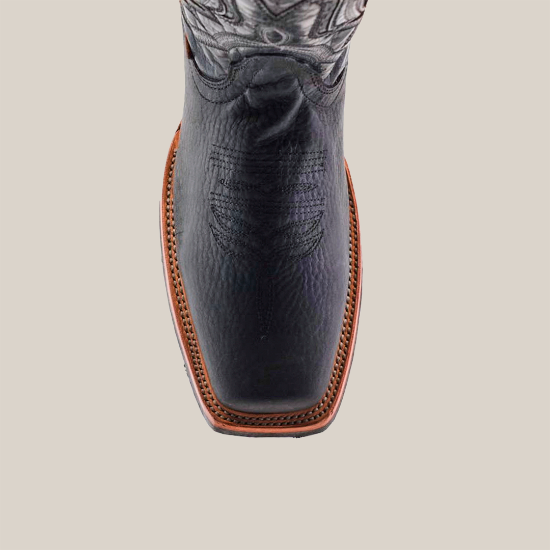 Top view of the Cheyenne Black cowboy boot featuring a Rodeo Toe, crafted from premium cowhide leather with intricate shaft stitching and a slip-resistant brown sole.