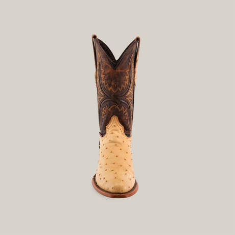 Front view of the Exotic Full Quilt Ostrich - Orix - Round Toe boot revealing a cream ostrich leather foot and dark brown shaft with intricate quilting. The boots design beautifully contrasts against a plain backdrop.