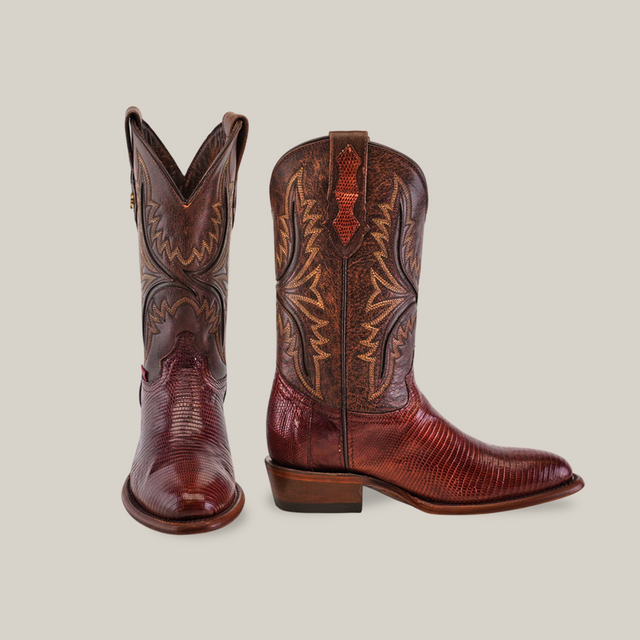 Discover the Exotic Lizard - Brown boots featuring a mix of dark and light brown exotic lizard skin patterns, intricate shaft stitching, a traditional squared toe, and medium-height wooden heel against a plain light background.