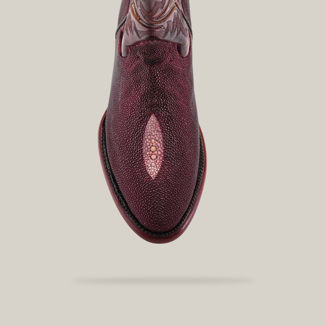 Top view of the Exotic Stingray - Wine - Square Toe cowboy boot in rich reddish-purple stingray leather with an intricate pattern near the square toe, set against a plain neutral background.