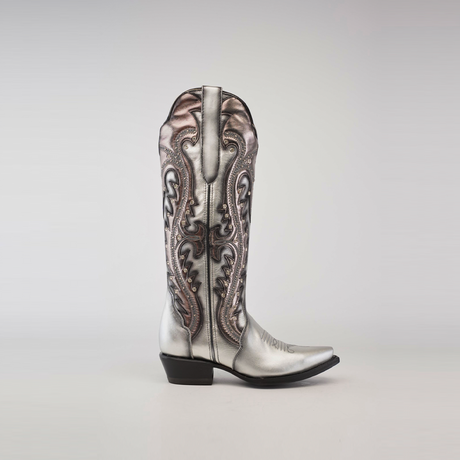 The Valentina Silver - Tall Shaft - Snip Toe cowboy boot is made from premium leather, featuring intricate swirling patterns and a pointed toe on a plain gray background.