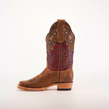 The Grecas Orix - Square Toe is a fashion-forward girls cowboy boot showcased against a white background. Made of premium brown leather, it features intricate embroidery, a maroon shaft with floral patterns, scalloped edges, and a wooden heel for a chic look.