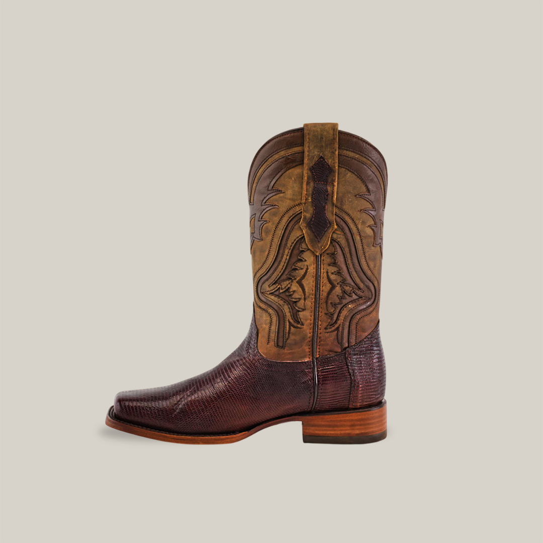 The Exotic Lizard - Brown boots are handcrafted with genuine lizard skin in dark brown for the lower and lighter brown leather upper with detailed stitching, featuring a square toe and wooden heel against a plain backdrop.