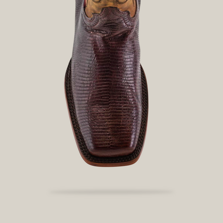 Close-up image of the Exotic Lizard - Brown shoe featuring a handcrafted design with an exotic lizard pattern and rodeo toe, viewed from above on a white background to highlight its unique texture and craftsmanship.