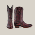 A pair of Exotic Caiman Hornback cowboy boots in Black Cherry, with intricate patterns and a textured, glossy finish. One boot is upright and the other angled to highlight the round toe and detailed stitching against a beige background.