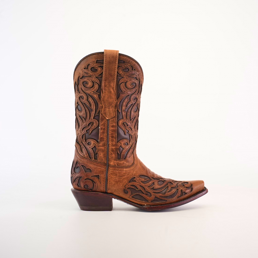 The Trivia Orix - Short Shaft - Snip Toe is a single brown cowboy boot, handcrafted from premium leather with intricate black floral patterns on the shaft and foot, elegantly showcased against a plain white background.