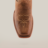 The image features a close-up of the Sierra Fawn - Wide Cutter Toe boot, crafted from premium cowhide leather. It highlights the intricate stitching on its wide cutter toe with a white stitched border against a plain white background.