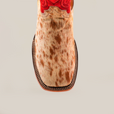 The Cowhide Hair Red Suede Shaft Pinto features a square toe in cowhide leather with a brown and cream speckled fur texture, a red suede shaft, intricate stitching along the sole, and is set on a plain white background