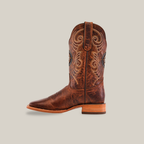 The Fresno Shedron Star - Square Toe cowboy boot features intricate stitching and a leather sole, crafted from premium cowhide, and is displayed against a plain white background.