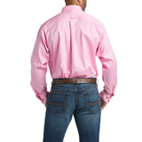 Wearing a Solid Twill Classic Fit Shirt Pink (10016692) and blue jeans with a brown belt, someone faces away from the camera.