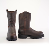 A pair of Brown Roper - Tractor Sole - Soft Toe boots is displayed, one facing forward and the other sideways. Crafted from premium dark brown cowhide leather, they feature pull tabs and a robust tractor sole with visible tread, set against a white background.