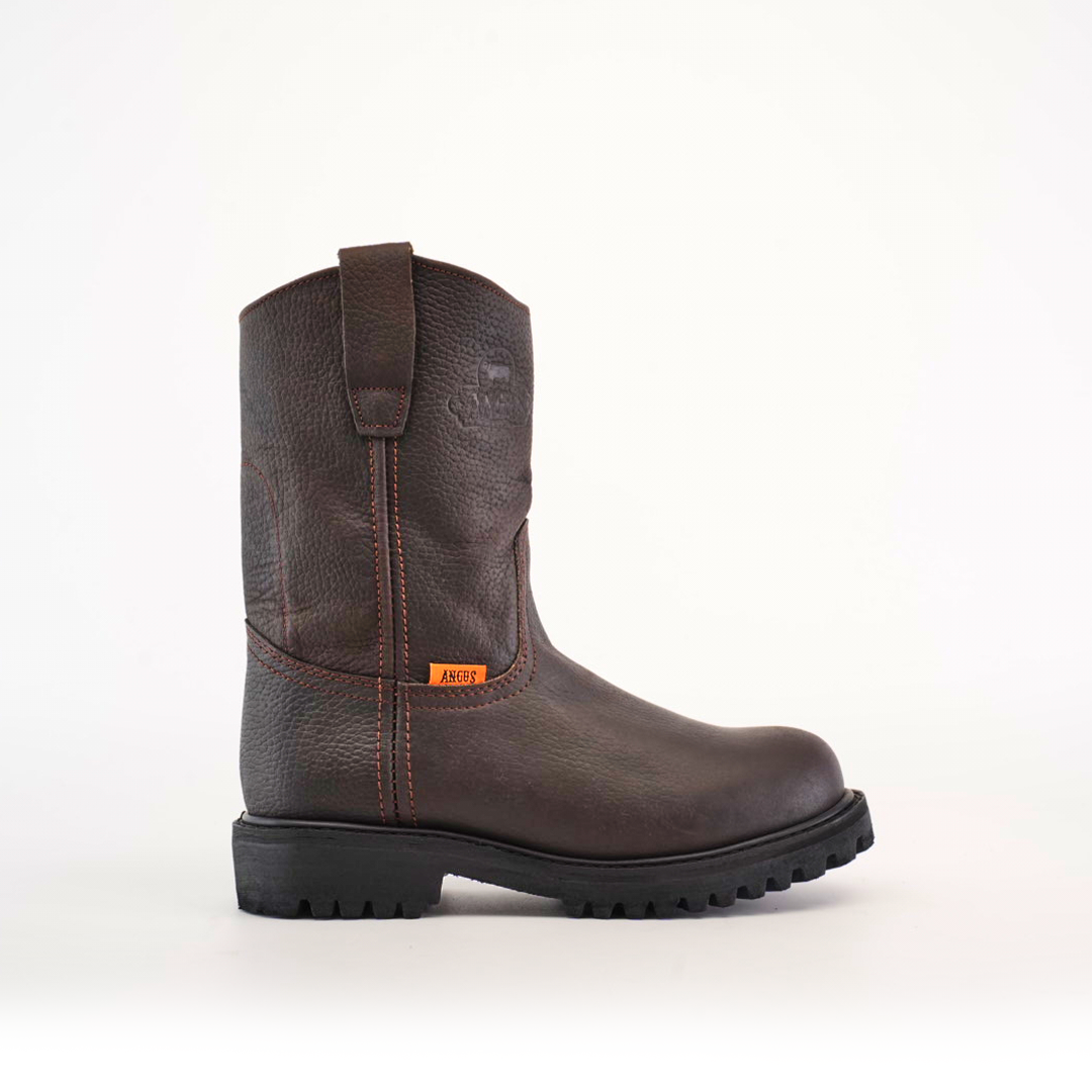 The Brown Roper features premium cowhide leather with a strong tractor sole and soft toe, displayed on a plain white background. It has a pull-on tab and orange stitching accents, showcasing style and durability.