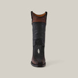 A Black Stingray Laser - Narrow Square Toe - CU628 boot, featuring an exotic leather lower and brown patterned upper, stands upright on a neutral background. The intricate laser-engraved design and detailed stitching are showcased from the back view.