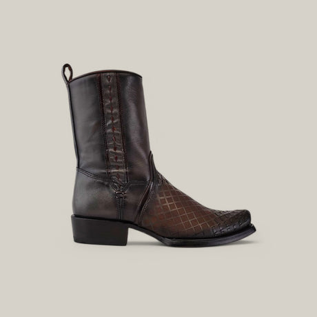 The Over Light Black Laser & Woven CU498 cowboy boot, with its narrow square toe and decorative stitching, features a dark brown leather finish. It is angled to highlight the side profile against a plain light gray background, complete with a short heel.