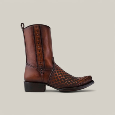 The Over Maple Laser & Woven - Narrow Square Toe - CU674 is a brown leather cowboy boot featuring a square toe and laser-etched design with dark stitching. A checkered pattern adorns the upper front, complemented by a short heel and pull tab. The backdrop is plain light gray.