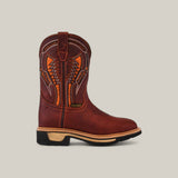 The Floter Shedron Composite Toe - E6987 by Texas Country Work Boots is a brown leather cowboy boot with orange stitching and decorative patterns, featuring a black heel and tan sole. Its design perfectly balances style and durability, ideal for those who value both.