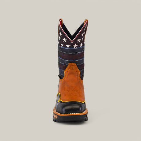 Front view of the Crazy Honey Soft Toe - E6296 shows a tan leather foot and tall shaft with an American flag motif, stars, and stripes. Black toe and heel details provide contrast. Renowned for durability, this Texas Country Work Boot stands resilient against a plain light gray background.